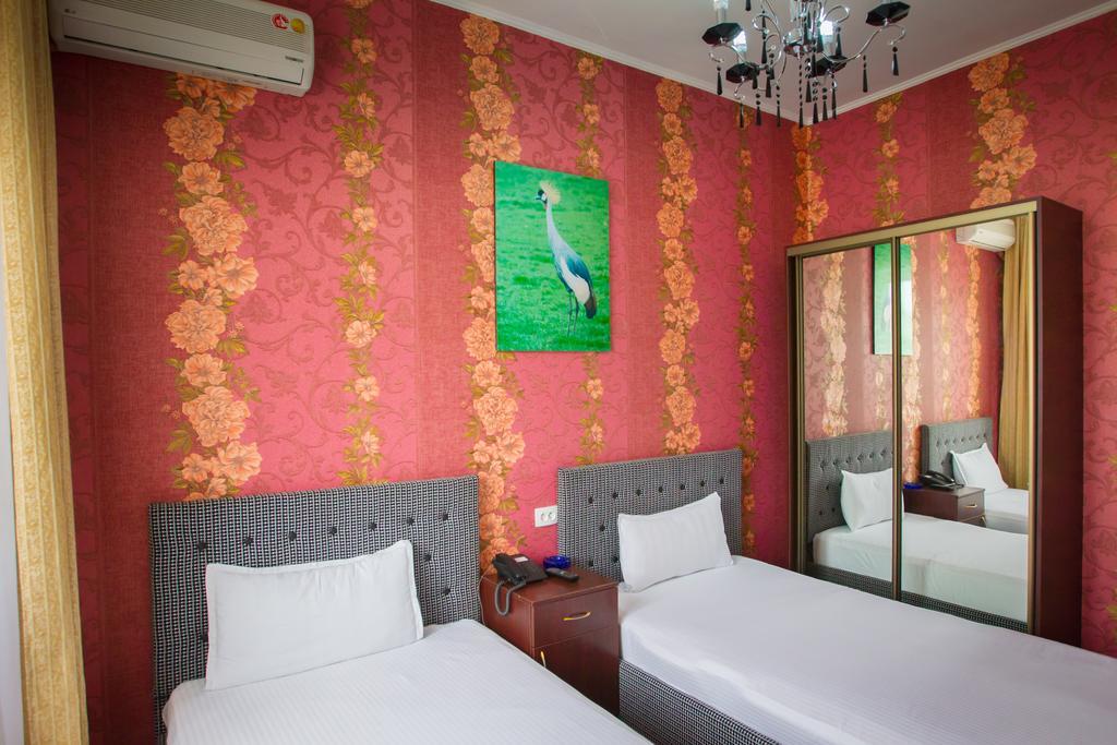 Diar Hotel Atyraū Quarto foto